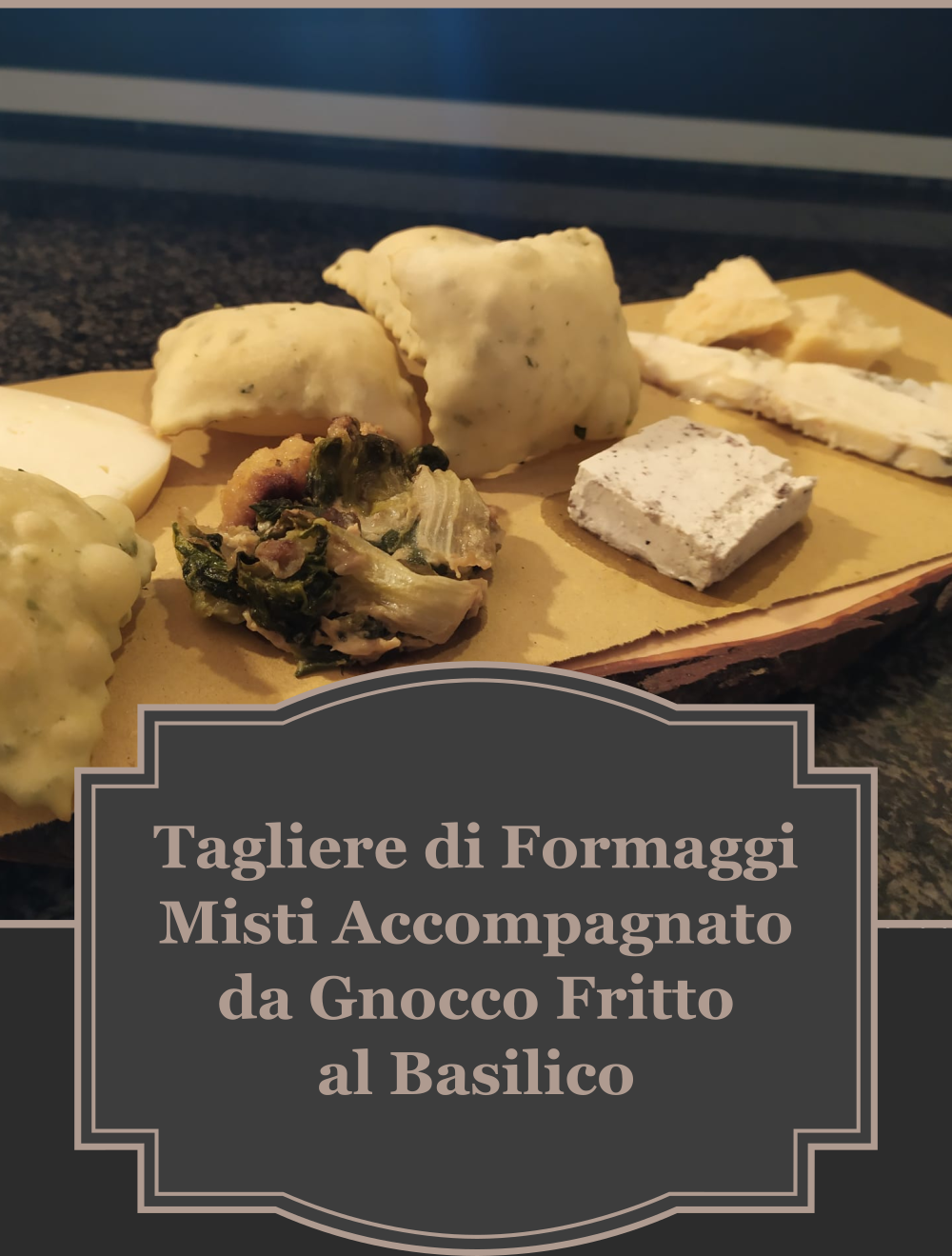 tagliere di formaggi misti accompagnato da gnocco fritto al basilico